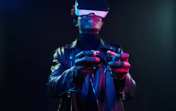 Virtual Reality Experience Futuristic Neon Lighting Young African American Man —  Fotos de Stock