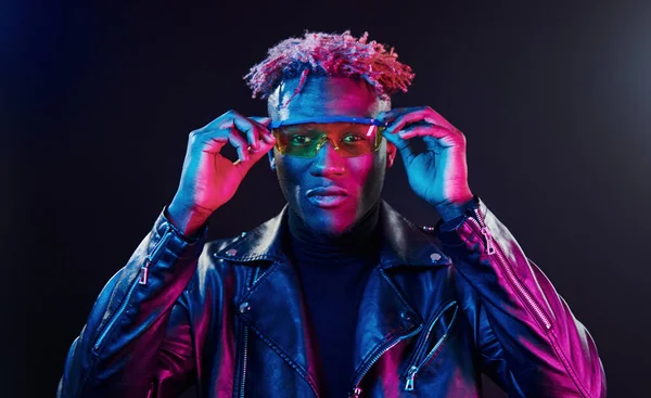 Glasses Futuristic Neon Lighting Young African American Man Studio — стокове фото