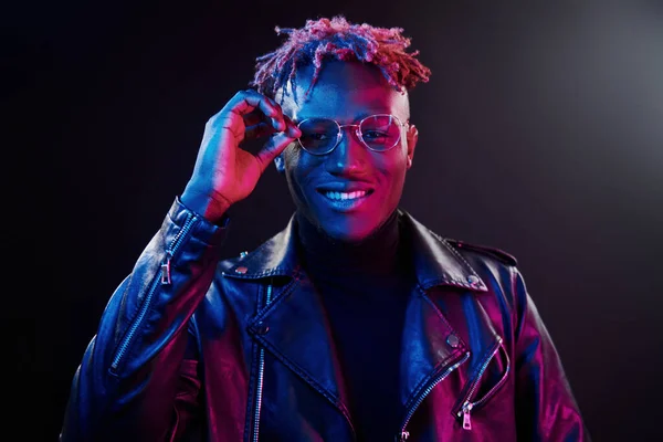 Futuristic Neon Lighting Young African American Man Glasses Standing Studio — стокове фото