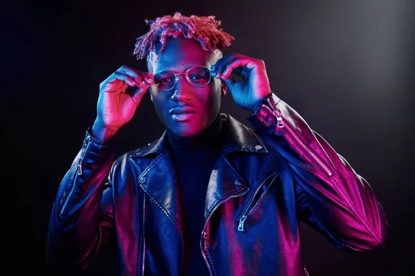 Futuristic Neon Lighting Young African American Man Glasses Standing Studio — стокове фото