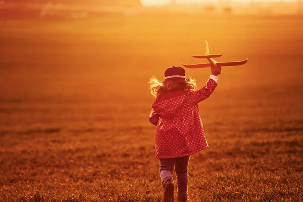 Illuminated Orange Colored Sunlight Cute Little Girl Have Fun Toy — Stock Photo, Image