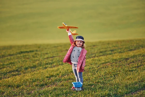 Cute Little Girl Have Fun Toy Plane Beautiful Green Field — Stock Fotó