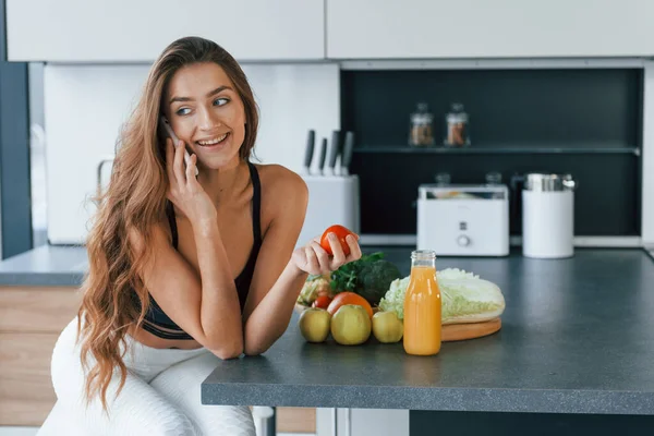 Talks Phone Young European Woman Indoors Kitchen Indoors Healthy Food — стокове фото