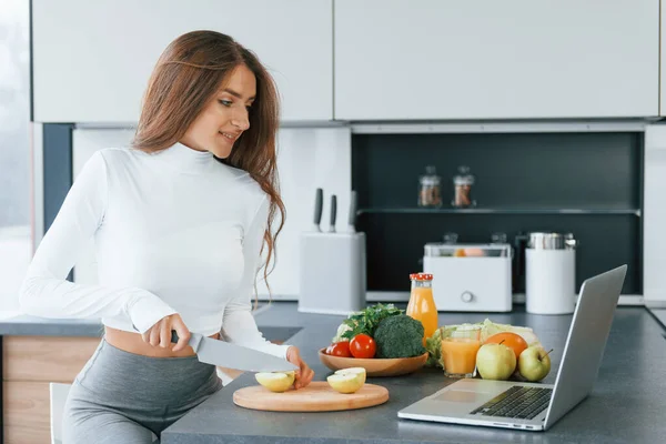 Uses Laptop Young European Woman Indoors Kitchen Indoors Healthy Food — Stockfoto