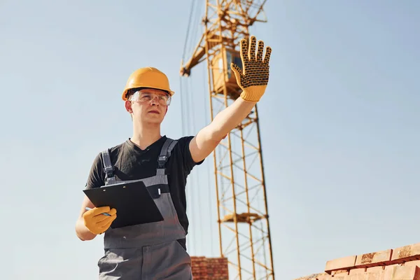 Shows Stop Sign Hand Construction Worker Uniform Safety Equipment Have — Fotografia de Stock