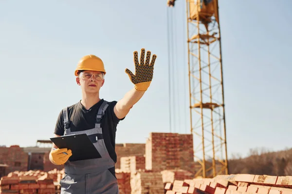 Shows Stop Sign Hand Construction Worker Uniform Safety Equipment Have — Fotografia de Stock