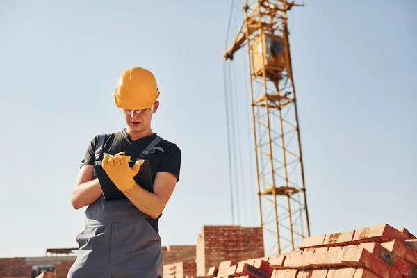 Holds Notepad Documents Construction Worker Uniform Safety Equipment Have Job — Foto de Stock