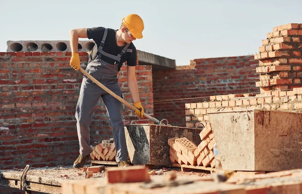 Using Showel Construction Worker Uniform Safety Equipment Have Job Building —  Fotos de Stock