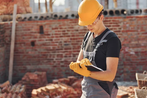 Holds Notepad Documents Construction Worker Uniform Safety Equipment Have Job — Foto de Stock