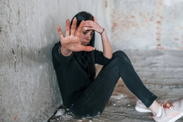 Stop Violence Young Beaten Woman Black Clothes Sitting Floor Abandoned —  Fotos de Stock