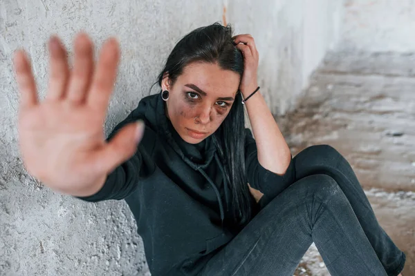 Stop Violence Young Beaten Woman Black Clothes Sitting Floor Abandoned — Stok fotoğraf