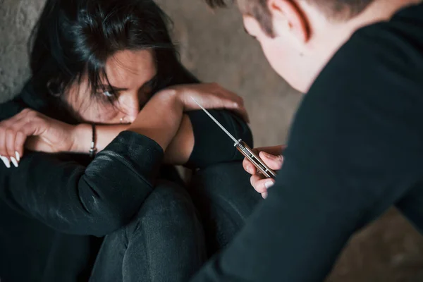 Kidnapped Woman Sitting Threatened Man Knife Hands Abandoned Building — Stock Photo, Image