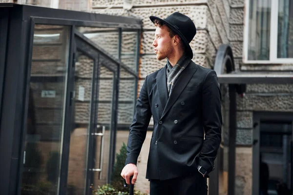 Elegant Young Man Black Hat Clothes Umbrella Hands Outdoors City — Fotografia de Stock