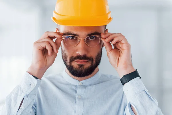 Portrait Engineer Orange Protective Hard Hat Glasses Standing Working Indoors —  Fotos de Stock