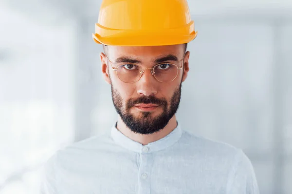 Portrait Engineer Orange Protective Hard Hat Glasses Standing Working Indoors — 스톡 사진
