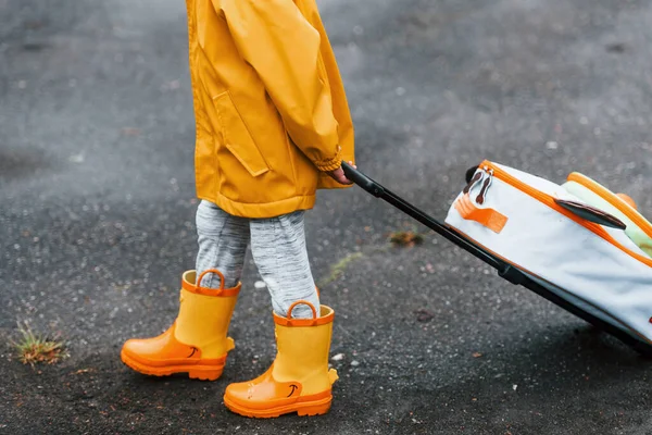 Close View Kid Yellow Waterproof Cloak Boots Walking Outdoors Suitcase — Stock Photo, Image