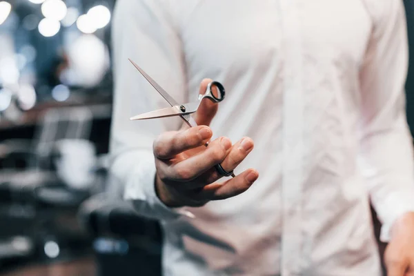 Close View Guy White Clothes Standing Indoors Barber Shop Holding — стоковое фото