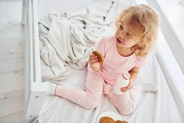 Having Breakfast Eating Cookies Cute Little Girl Casual Clothes Indoors — Stock Photo, Image