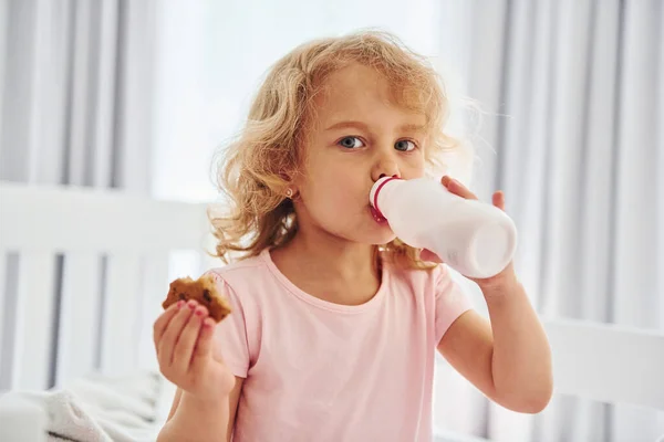 Having Breakfast Eating Cookies Cute Little Girl Casual Clothes Indoors — Stock Photo, Image