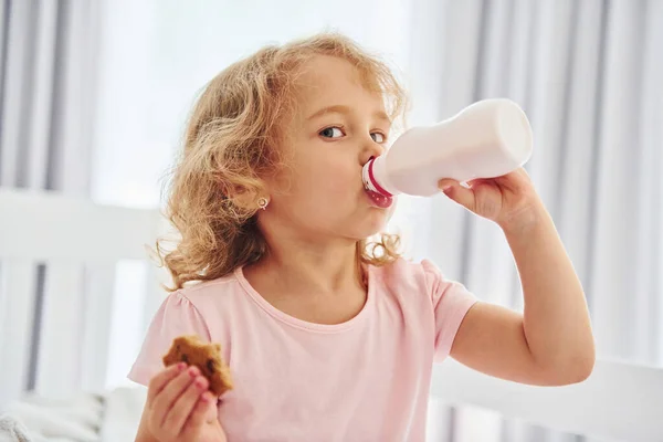 Having Breakfast Eating Cookies Cute Little Girl Casual Clothes Indoors — Stock Photo, Image