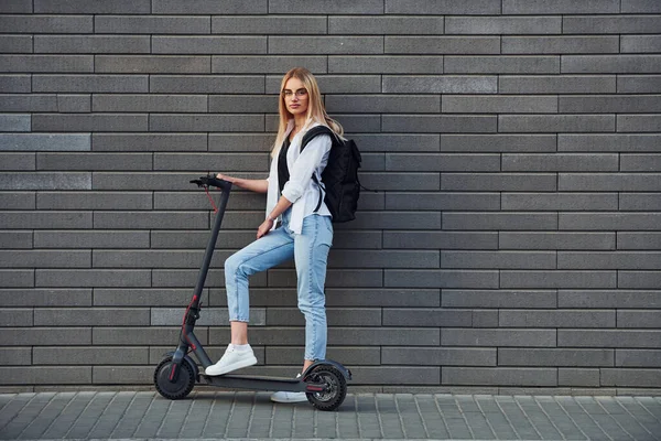 Side View Beautiful Blonde Casual Clothes Riding Electric Schooter Outdoors — Stockfoto