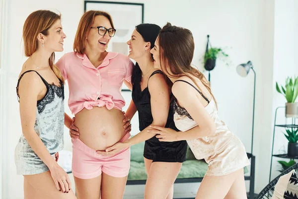 Cheerful Young Women Pregnant Friend Pajamas Standing Have Party Indoors — Stock Photo, Image