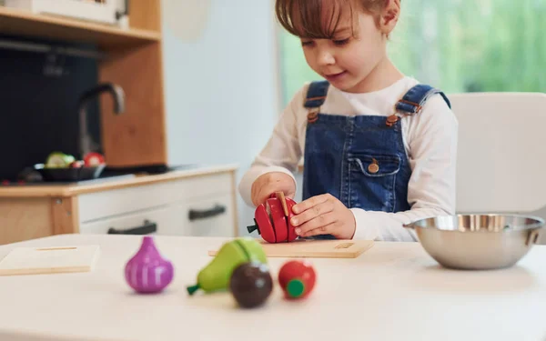 Little Girl Casual Clothes Sits Table Having Fun Playing Toys — Stock Photo, Image