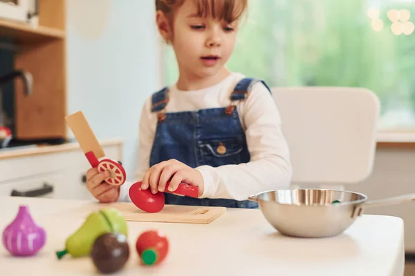 Little Girl Casual Clothes Sits Table Having Fun Playing Toys — Stock Photo, Image