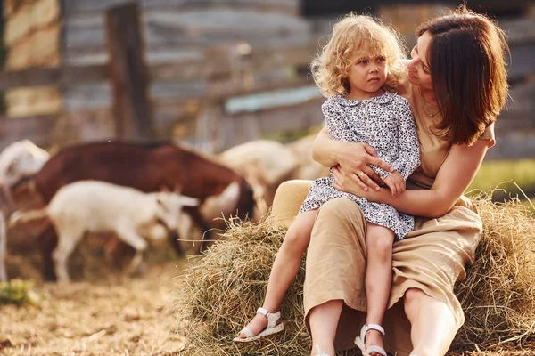 Young Mother Her Daughter Farm Summertime Goats — Stock Photo, Image