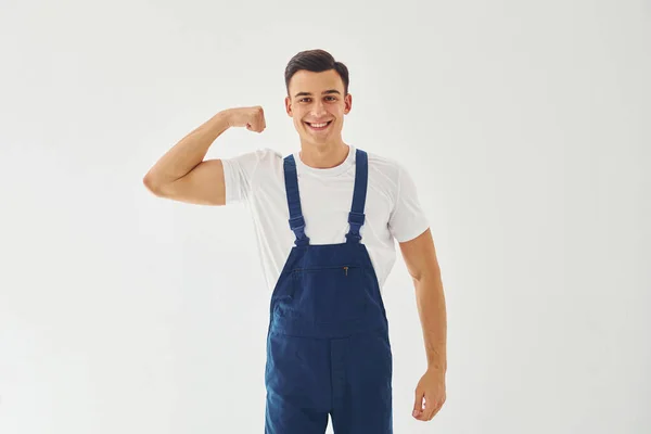 Muestra Bíceps Listo Para Trabajar Hombre Trabajador Uniforme Azul Pie —  Fotos de Stock