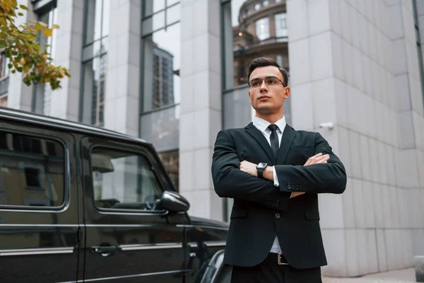 Standing Arms Crossed Businessman Black Suit Tie Outdoors City — Stock Photo, Image