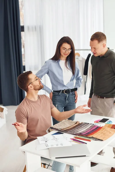 Cheerful workers. Group of people togethe in the office.