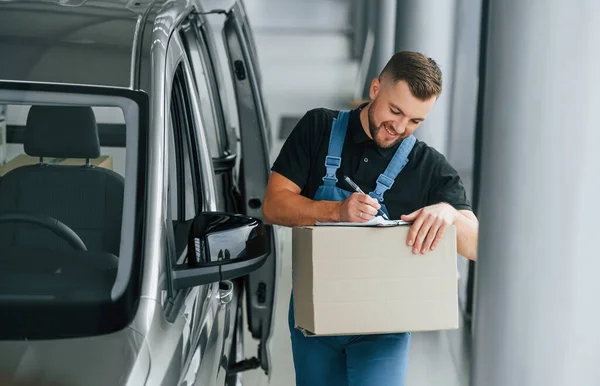 Blue Colored Clothes Delivery Man Uniform Indoors Car Order — Stock Photo, Image