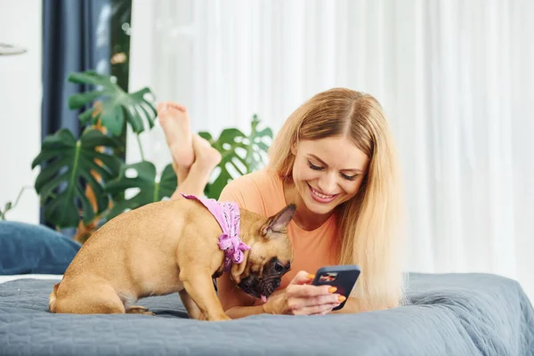 Laying Bed Woman Pug Dog Home Daytime — Stock Photo, Image