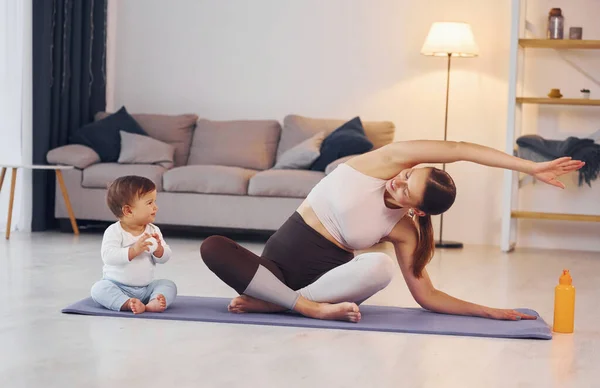 Practicing Yoga Mother Her Little Daughter Home Together — Stock Photo, Image