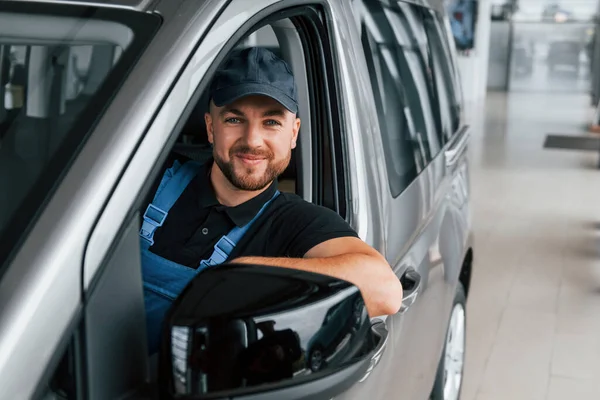 Sitting Vehicle Holding Document Delivery Man Uniform Indoors Car Order — Stock Photo, Image