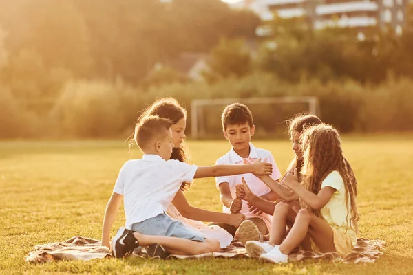Beautiful Sunlight Group Happy Kids Outdoors Sportive Field Daytime — Stock Photo, Image