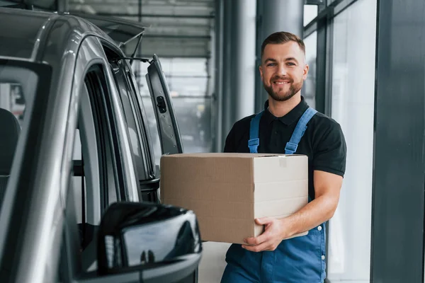 Box Hands Delivery Man Uniform Indoors Car Order — Stock Photo, Image