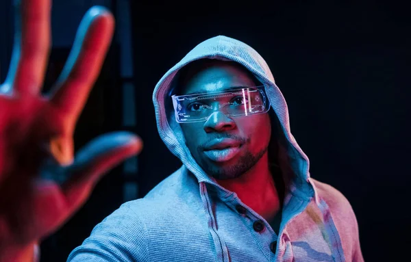 Special Eyewear Futuristic Neon Lighting Young African American Man Studio — Stock Photo, Image
