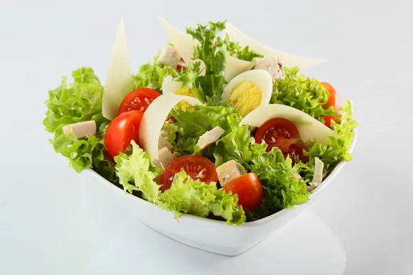 Fresh summer salad on white background — Stock Photo, Image