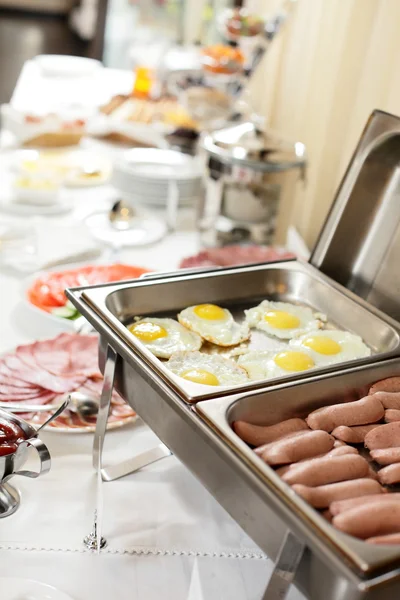 Table at restaurant with different food — Stock Photo, Image