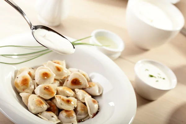 Hot dumplings on the dish — Stock Photo, Image
