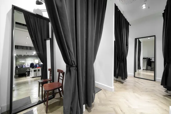 Interior of dressing room at cloth store — Stock Photo, Image