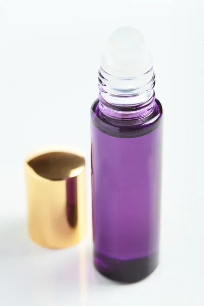 Little parfume bottle on white background — Stock Photo, Image