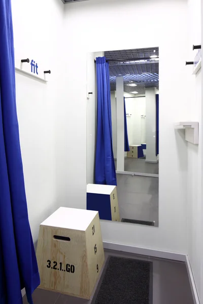 Interior of dressing room at cloth store — Stock Photo, Image