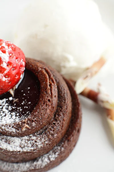 Tasty peace of cake in white dish — Stock Photo, Image