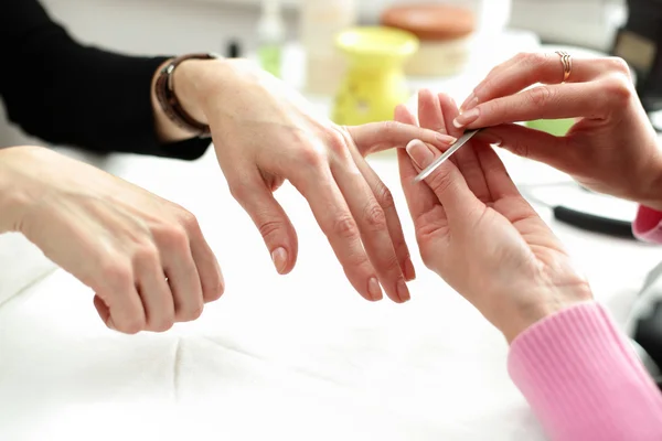 Cuidado de uñas sobre fondo blanco —  Fotos de Stock