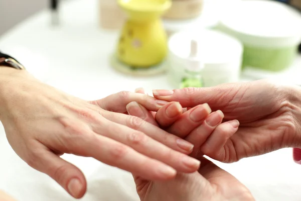 Cuidado de uñas sobre fondo blanco —  Fotos de Stock