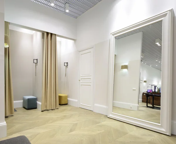 Interior of dressing room at cloth store — Stock Photo, Image