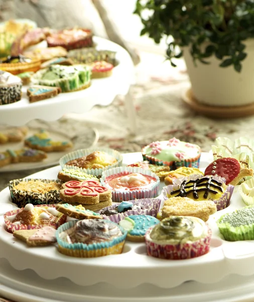 Group of cupcakes and biscuits — Stock Photo, Image